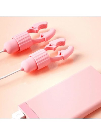 Электрический вибрирующий зажим для сосков «Электроискра» с USB-зарядкой — регулируемый БДСМ стимулятор, светло-розовый - Электрический зажим для сосков, включённый и работающий.